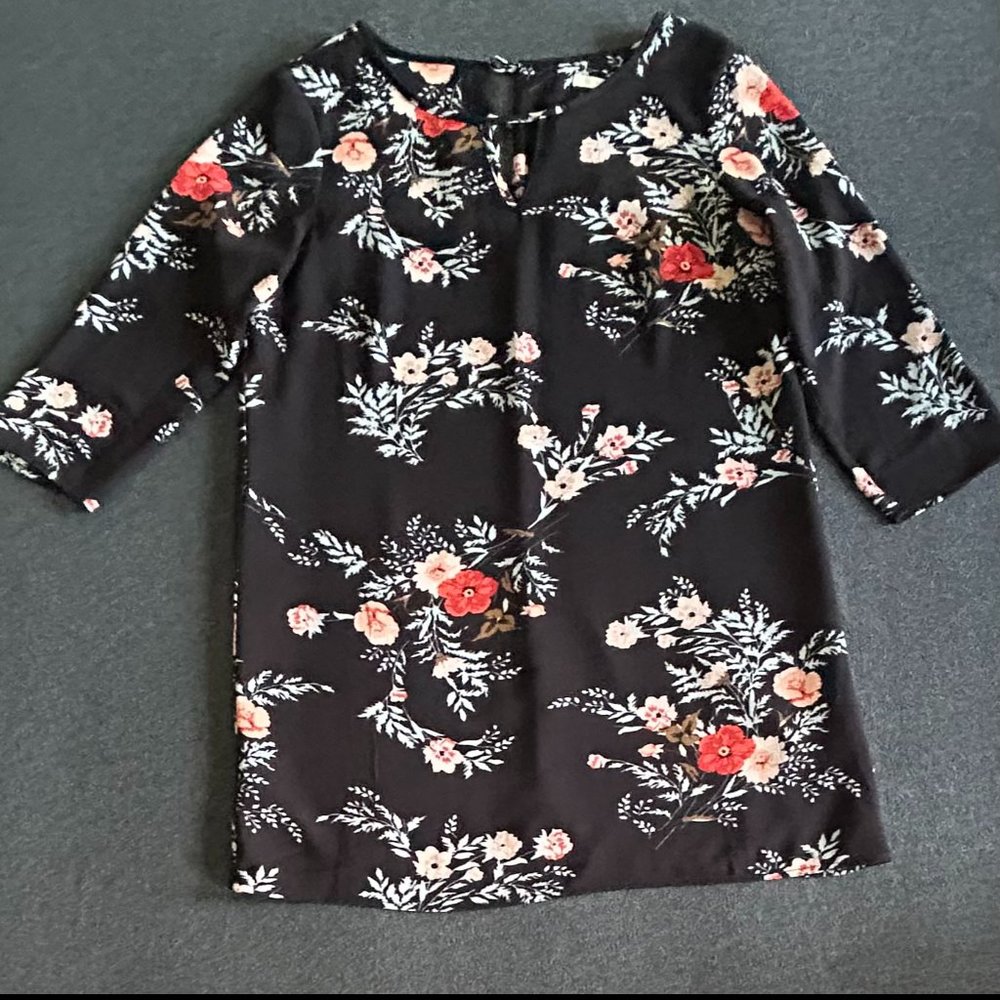 Black mini dress with floral print by C&E